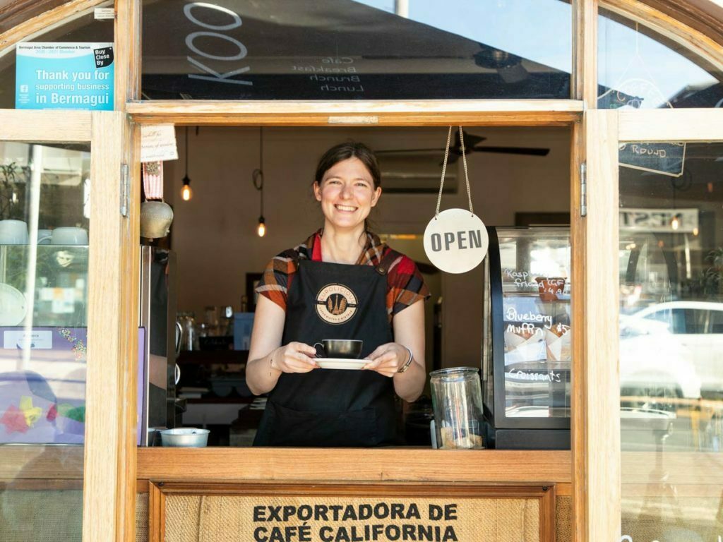 happy staff serving coffee at eurolicious