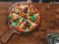 Delicious pizza cut into 8