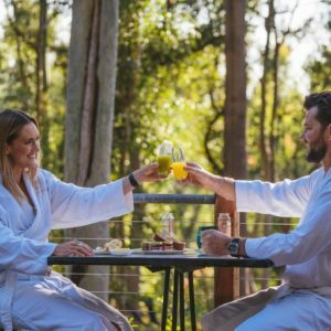 couple having breakfast at The Bower at Broulee